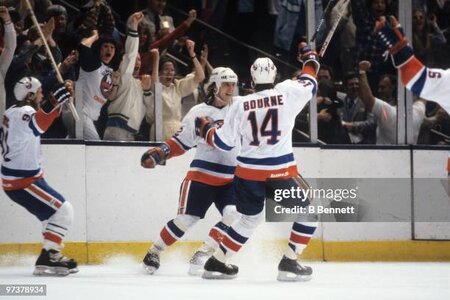 uniondale-ny-mike-bossy-of-the-new-york-islanders-celebrates-his-game-winning-goal-with.jpg