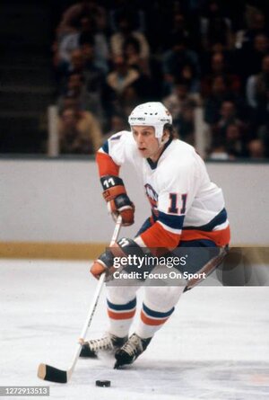 uniondale-ny-wayne-merrick-of-the-new-york-islanders-skates-during-an-nhl-hockey-game-circa.jpg