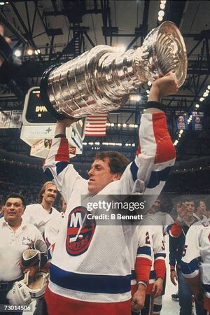 canadian-professional-ice-hockey-player-wayne-merrick-of-the-new-york-islanders-lifts-the.jpg