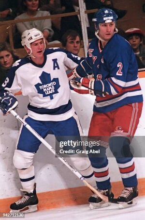 toronto-on-todd-gill-of-the-toronto-maple-leafs-skates-against-tom-laidlaw-of-the-new-york.jpg